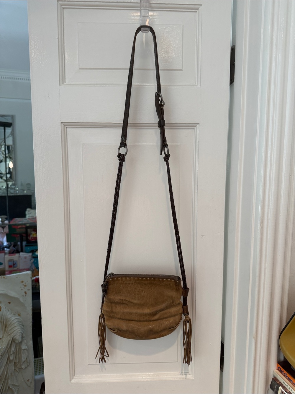 Women's Brown Leather Crossbody Bag with Tassel Accents